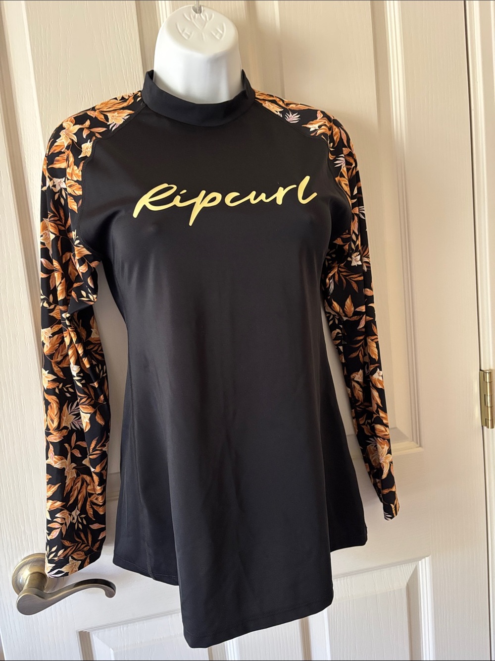 Rip Curl Black Long Sleeve Rash Guard with Tan Floral Sleeves